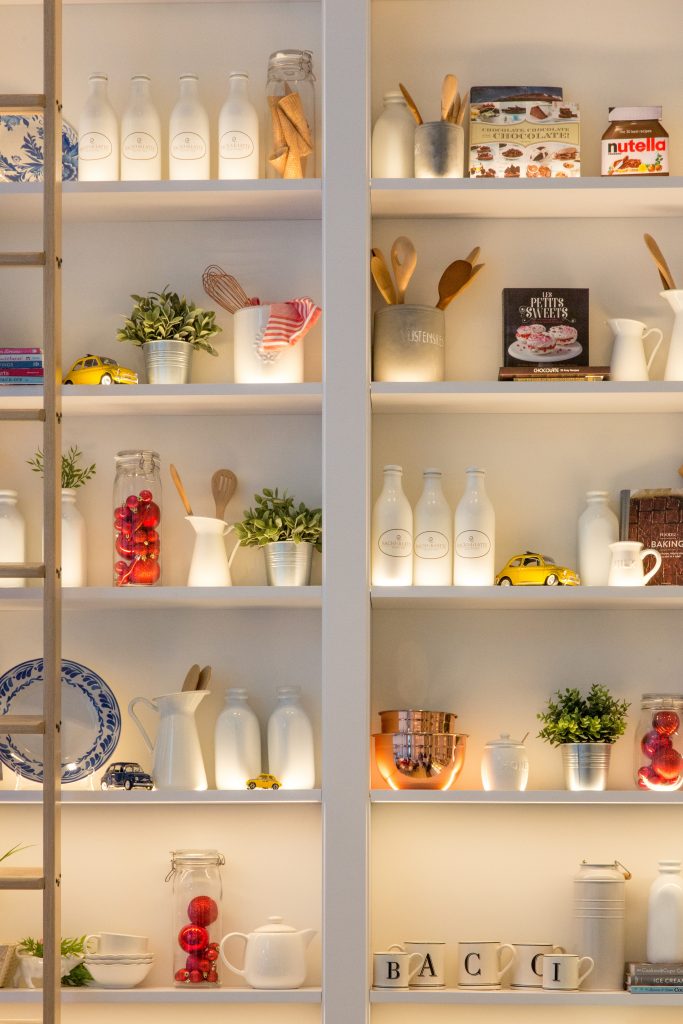 how to start organizing a messy house picture of organized white shelves that look clean and organized