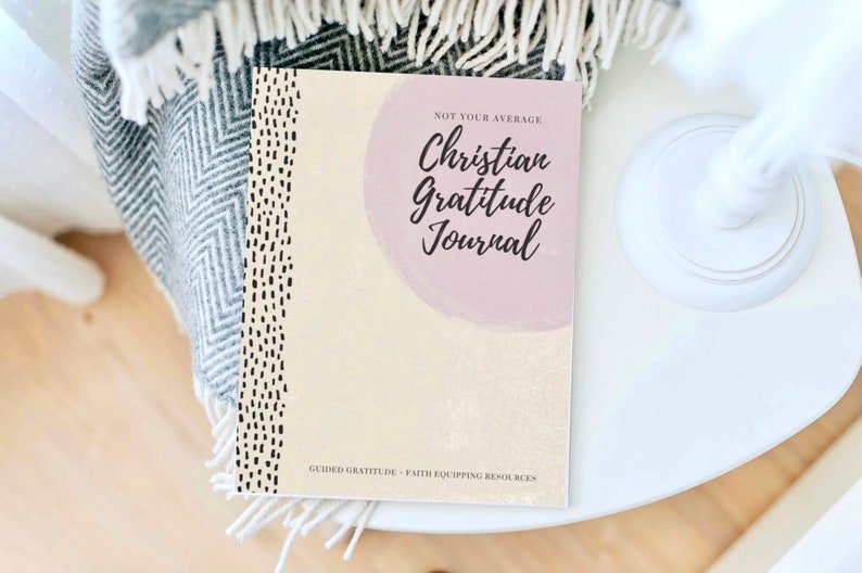 tan and pink gratitude journal