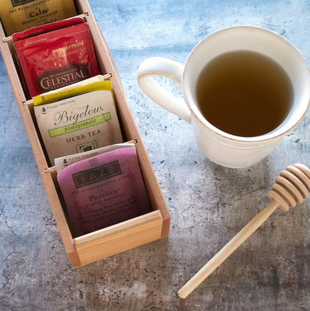 tea organizer with tea cup and honey wand