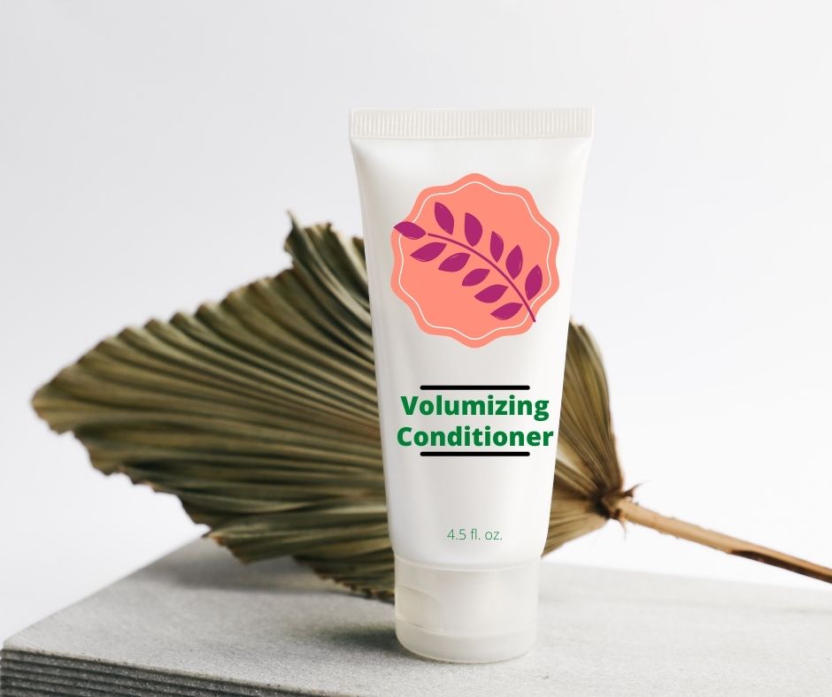 hair conditioner bottle in front of a leaf for fabric softener alternative