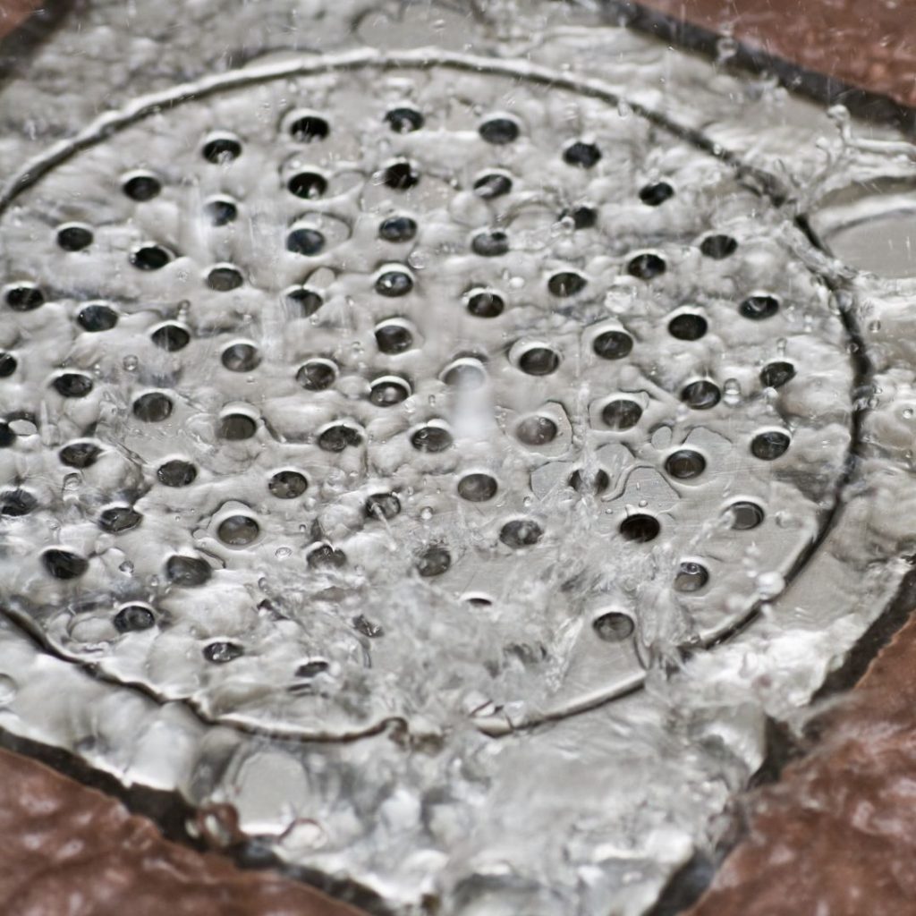 water running down a drain