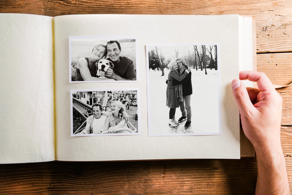 take pictures of sentimental clothes and put them into a photo album like this one