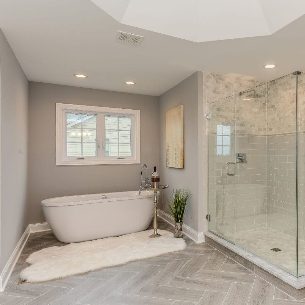 fluffy bathroom rub in front of bathtub