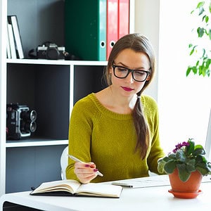 woman proofreading and editing