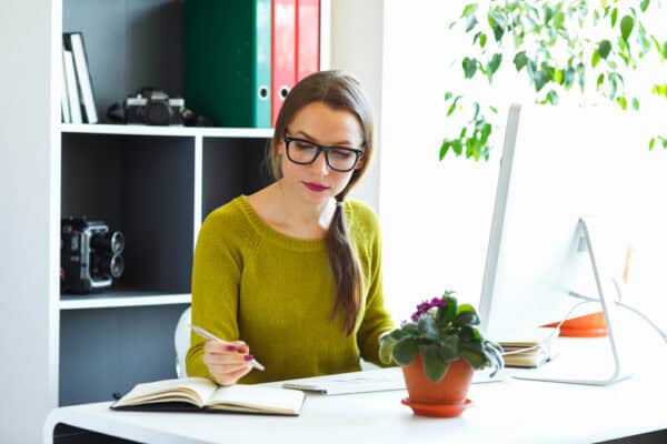 woman proofreading and editing